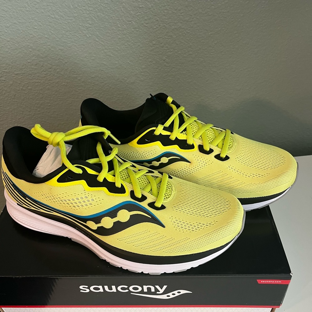 Brand news Saucony Mens running shoes! Size 11, never worn.